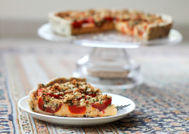 Food Lust People Love: In this Stuffed Plum Tomato Tart with Black Olive Shortcrust, the flavors are Mediterranean, from the red ripe plum tomatoes and the mozzarella and anchovy stuffing, to the black olive shortcrust.