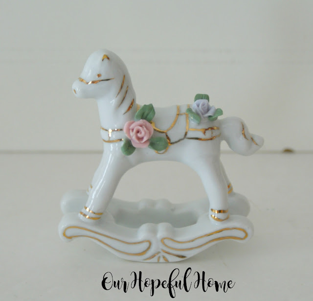 Vintage Enesco porcelain rocking horse with gilding and flowers