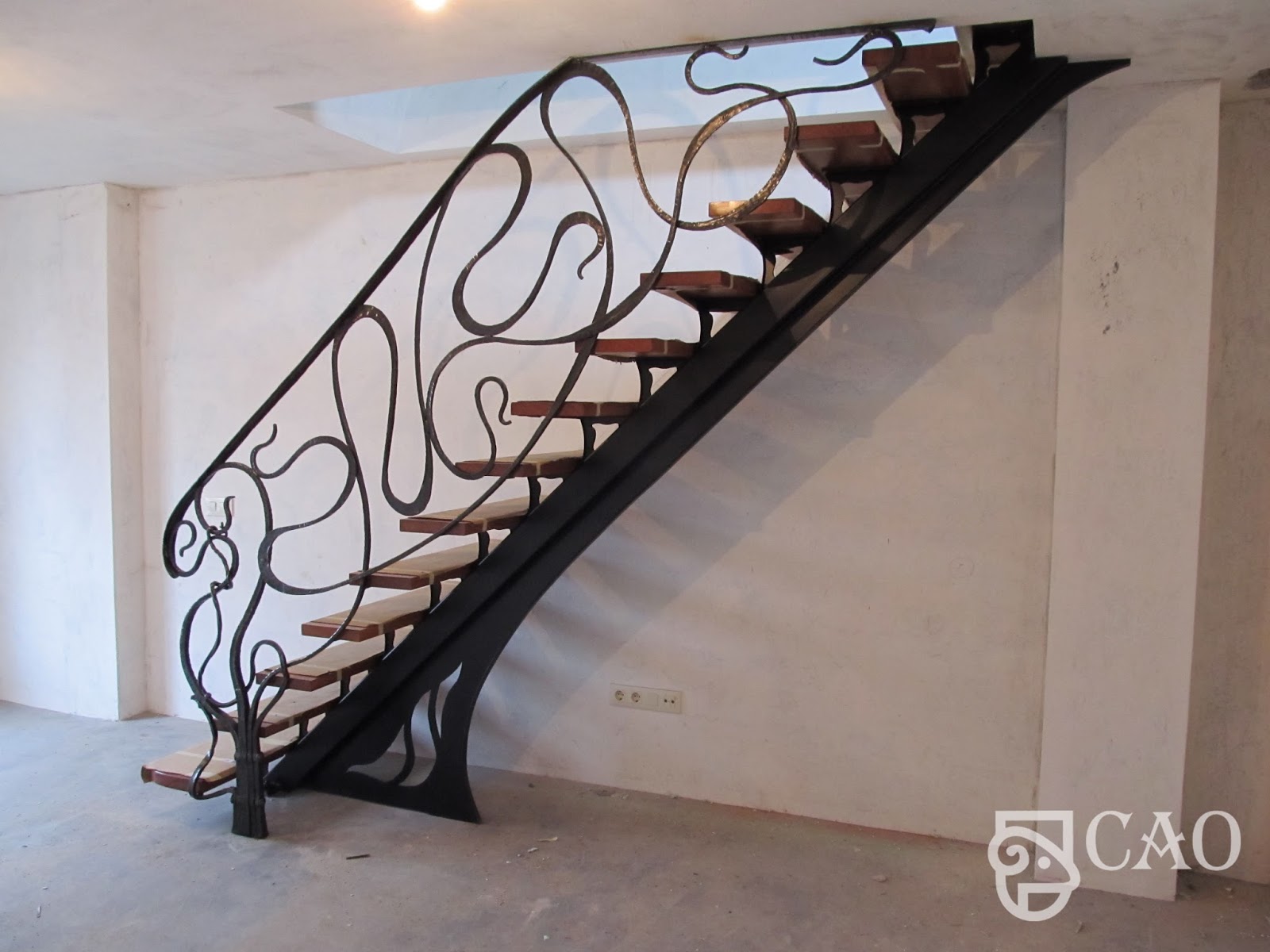 Ideas para decorar barandillas de hierro forjado para tus escaleras