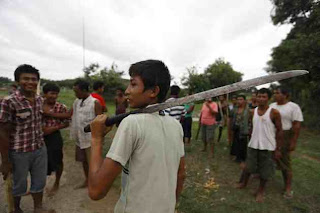 2012-06-09T170141Z_390675158_GM2E86A02JB01_RTRMADP_3_MYANMAR-VIOLENCE-3.JPG