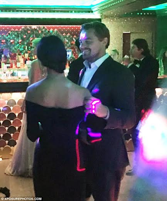 5 Actor Leonardo DiCaprio can't keep his eyes or hands off mystery lady at party (photos)