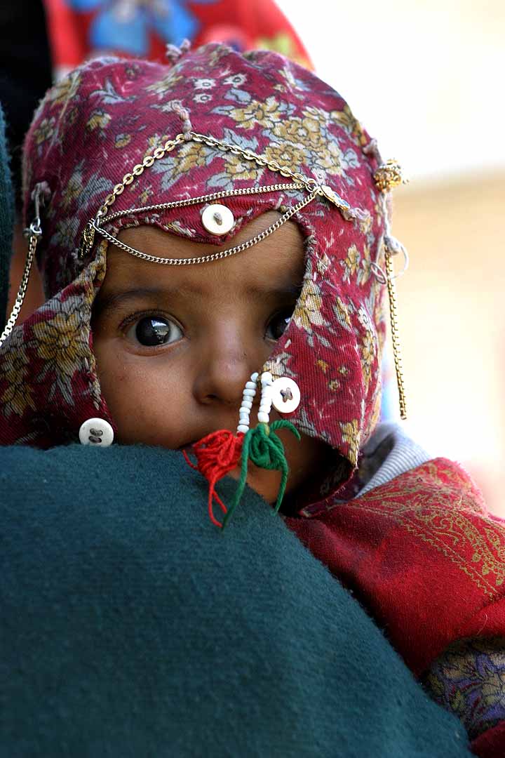 Awake and Painting Kashmiri Baby