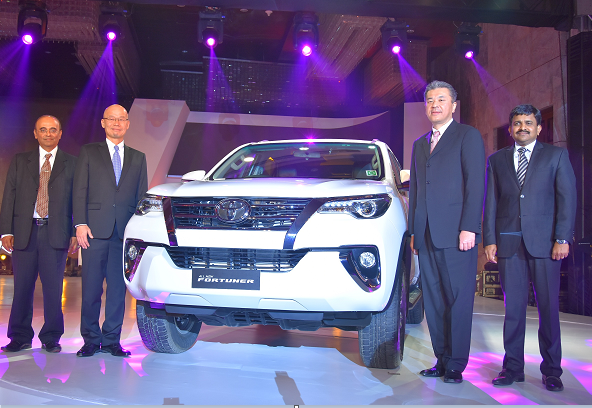 Photo Caption (From L-R) : Mr. T S Jai Shankar , Deputy Managing Director, TKM, Mr. Akito Tachibana, M.D, TKM, Mr. Hiroki Nakajima, Managing Officer, TMC and Mr. N. Raja, Director & Senior Vice President (Sales & Marketing), TKM at the official launch of all new Toyota Fortuner in New Delhi. Photo Caption (From L-R) : Mr. T S Jai Shankar , Deputy Managing Director, TKM, Mr. Akito Tachibana, M.D, TKM, Mr. Hiroki Nakajima, Managing Officer, TMC and Mr. N. Raja, Director & Senior Vice President (Sales & Marketing), TKM at the official launch of all new Toyota Fortuner in New Delhi.