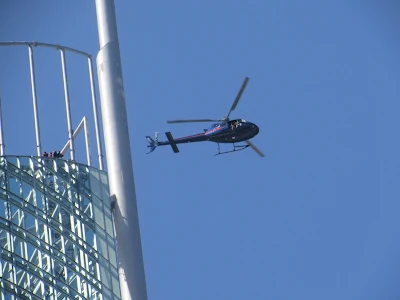 Helicopter over Q1 Tower