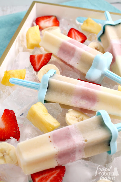 These cool & creamy Banana Split Ice Cream Pops are made with just 3 simple ingredients- vanilla ice cream, cold milk, & fresh fruit. A perfect frosty treat for summertime!