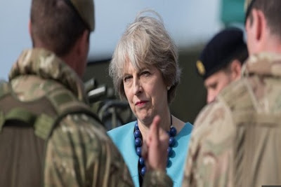 Britain's Theresa May Says Airstrikes on Syria in British National Interest