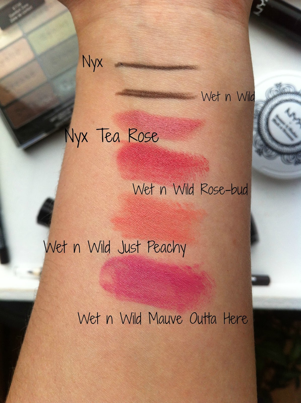 Nyx Wet n Wild swatches lipstick eyeliner brown tea rose rose bud just peachy mauve outta here