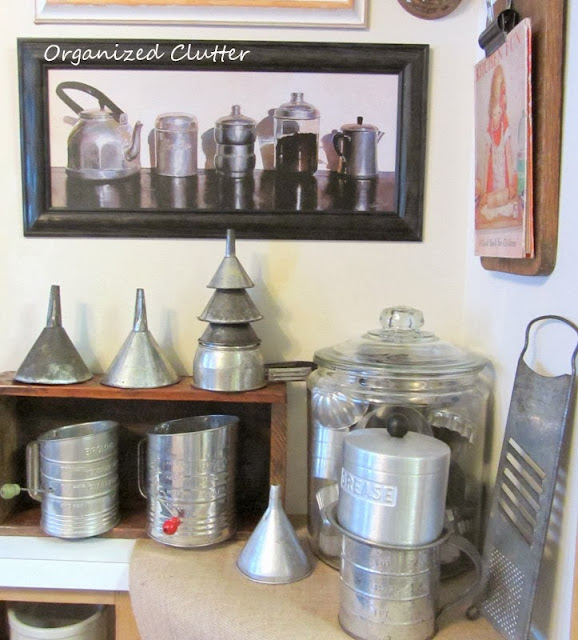 An Industrial Look Kitchen with Tin and Aluminum Utensils www.organizedclutterqueen.blogspot.com