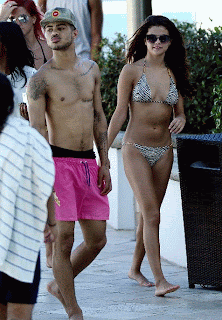Selena Gomez wearing a Zebra Bikini and Tattoo in Miami