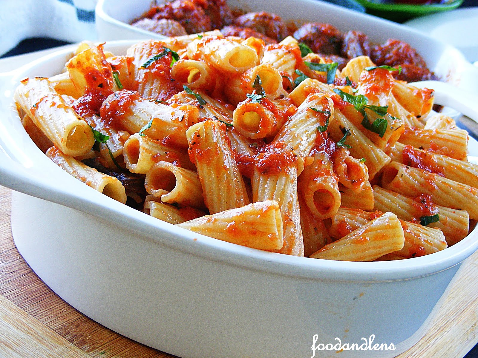 Food and lens Rigatoni Pasta With Beef Meatballs.
