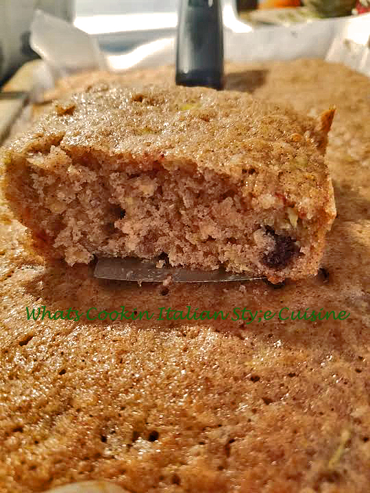 Zucchini Chocolate Chip Bars Zucchini Chocolate Chip Bar are a bar kind of cake square with zucchini and chocolate chips added to the batter . These are in a brownie rectangular pan and cut in square You can see how moist they are in the photo