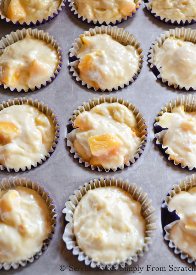 Peach Crumb Muffins divide peach batter evenly between muffin tins from Serena Bakes Simply From Scratch.