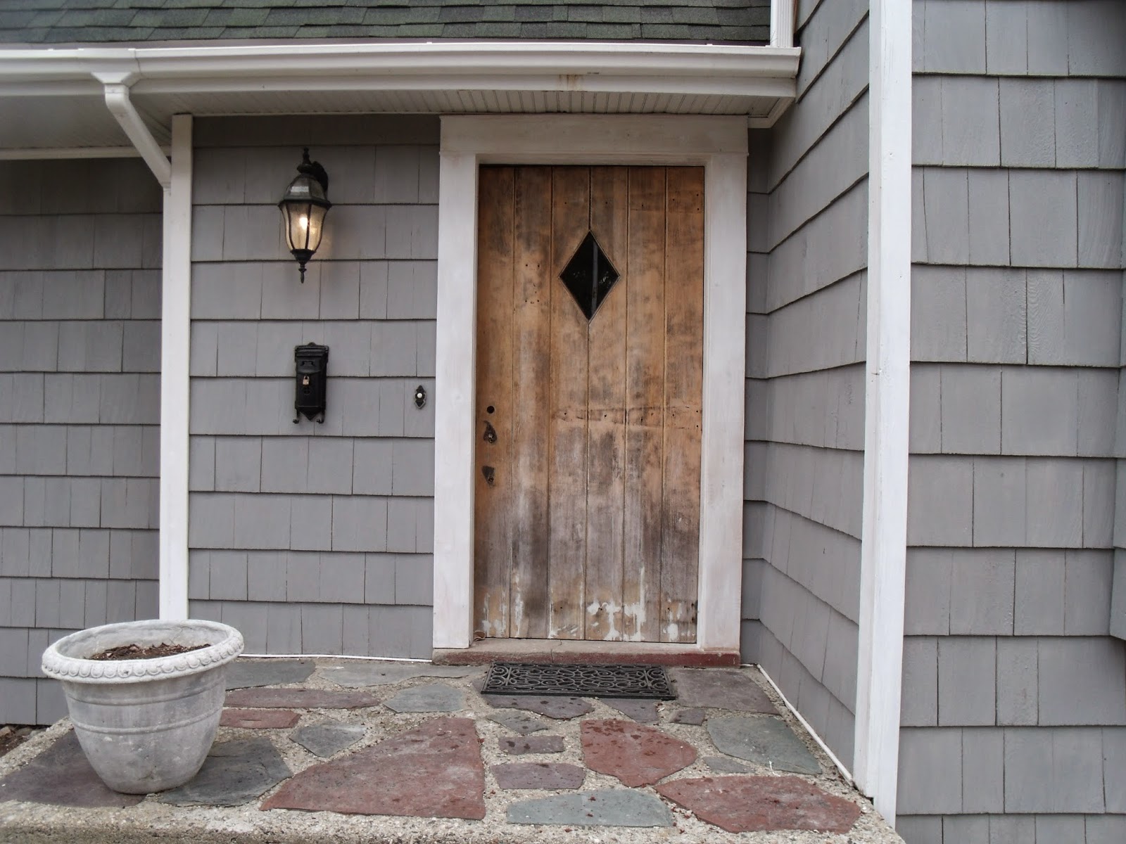 Gear Acres at Top of the Hill Priming the Front Door and Burning My