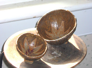 pinch pots in window