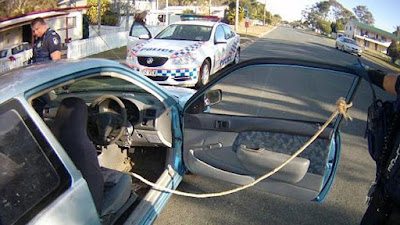 Police left stunned after finding car with door held shut with piece of ...