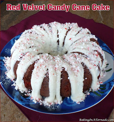 Beautiful for the holidays or any time of the year, Red Velvet Candy Cane Cake will be a new family favorite. | Recipe developed by www.BakingInATornado.com | #recipe #cake #Christmas