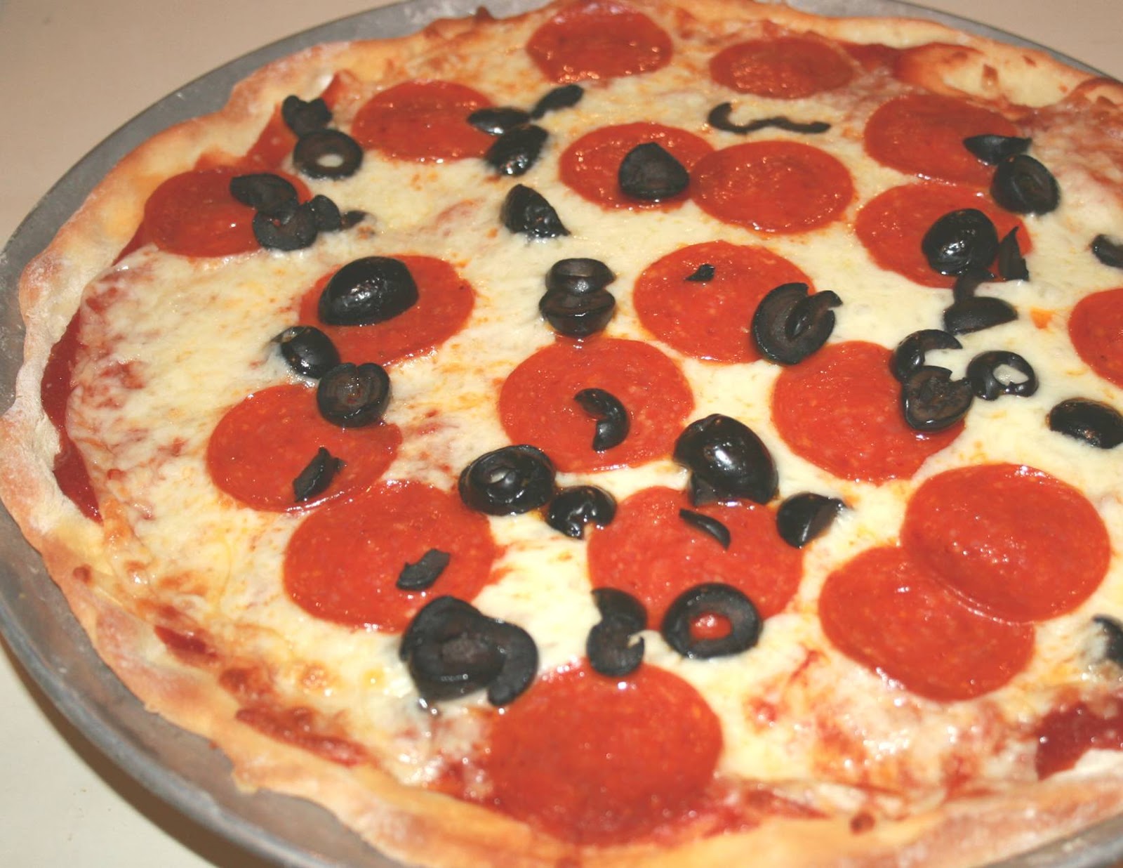 Neighbors About Town Spicy pizza