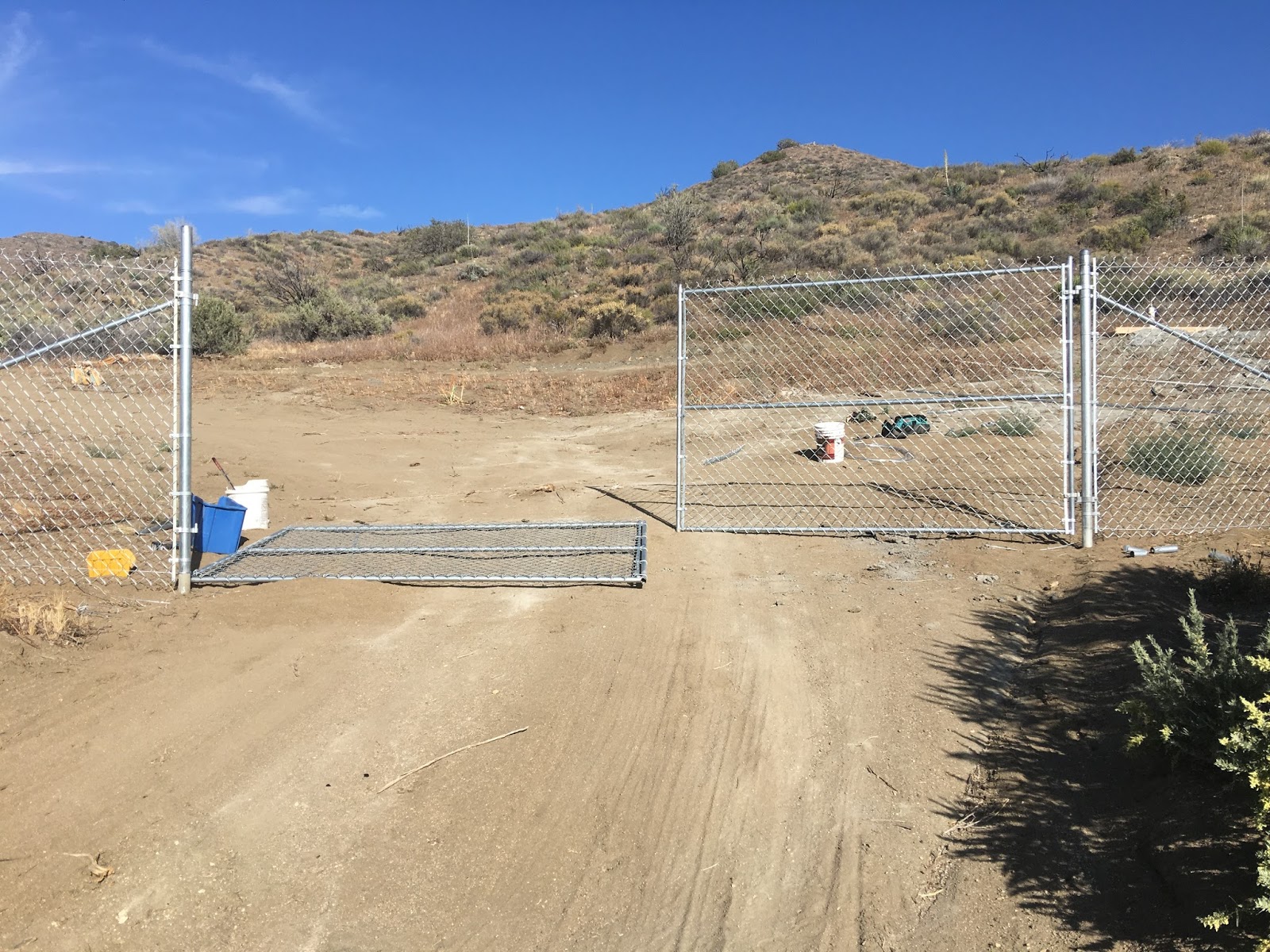 The Fence CHAIN LINK ON HILLSIDE