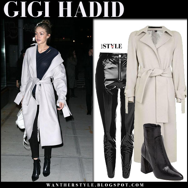 Gigi Hadid in grey belted coat and black vinyl pants in New York on