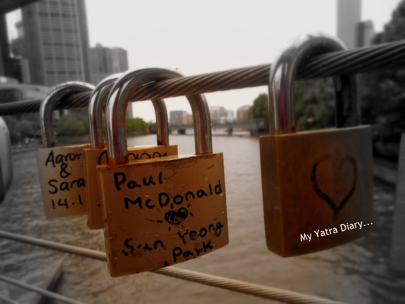 Love locks along the Yarra River footbridge, Melbourne in Australia
