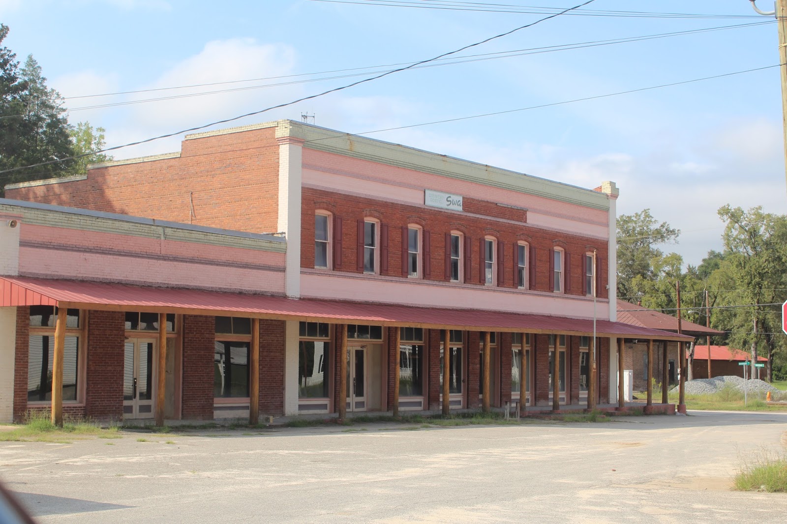 IMAGES OF OUR PAST BANK, TOOMSBORO, LOCATED AT FAR RIGHT OF