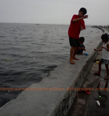 fishing for lunch in Manila Bay