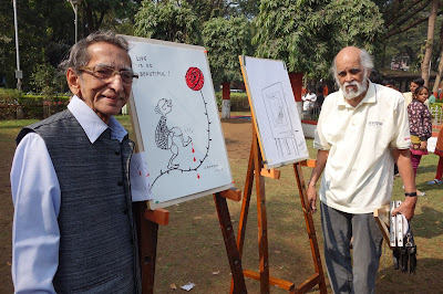 S. D. (Shi Da) Phadnis and Mangesh Tendulkar with their cartoons S. D. (Shi Da) Phadnis and Mangesh Tendulkar with their cartoons