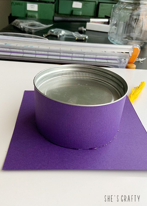 how to make a graduation advice jar -attach cardstock to lid making a graduation cap