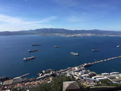 toward Algeciras over Gibraltar’s moles and dockyards