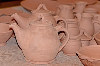 clay teapots waiting to be fired