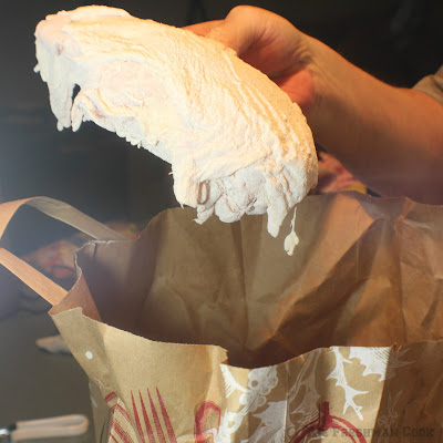 raw chicken, flour in paper bag