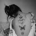 Butterfly revolution tattoo on full back
