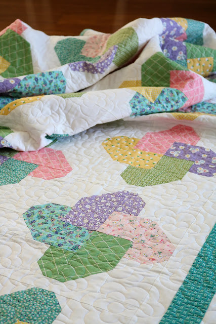 Winsome quilt pattern from the Fresh Fat Quarter Quilts book by Andy Knowlton of A Bright Corner - cute pinwheel quilt blocks and the quilt uses just 10 fat quarters