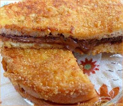 Grilled Nutella Crunch Sandwich, a crispy crunchy ooey gooey nutella sandwich dipped in a crunchy topping and grilled in a saute pan | Recipe developed by www.BakingInATornado.com | #recipe #sandwich