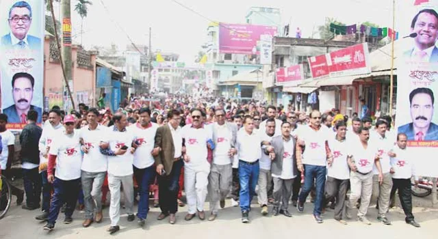 Jamalpur municipality's colorful rally on the occasion