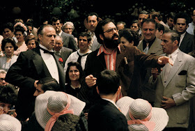 Marlon Brando with director Francis Ford Coppola in The Godfather movieloversreviews.filminspector.com