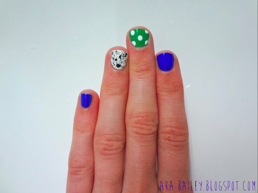Blue nail polish, two accent nails, polka dots on green nail