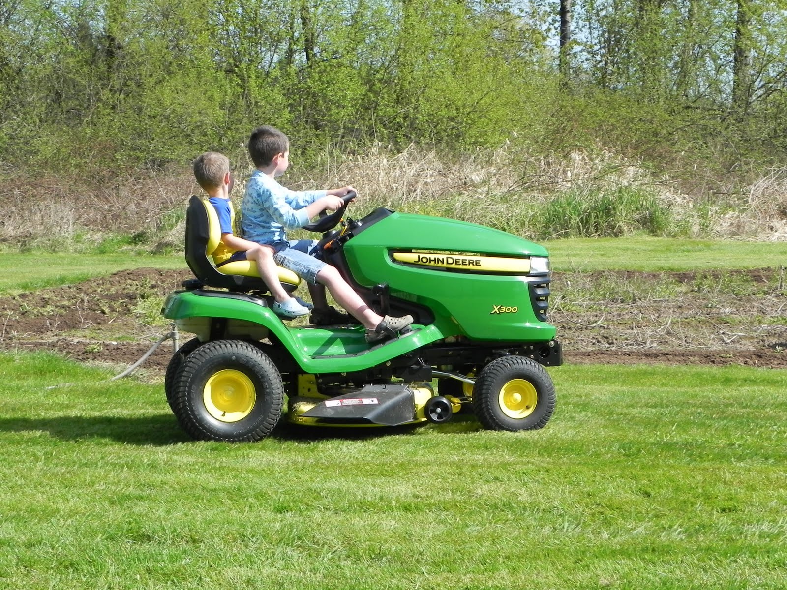 Ward Family: 4 Wheeler and Lawn Mower Excitement