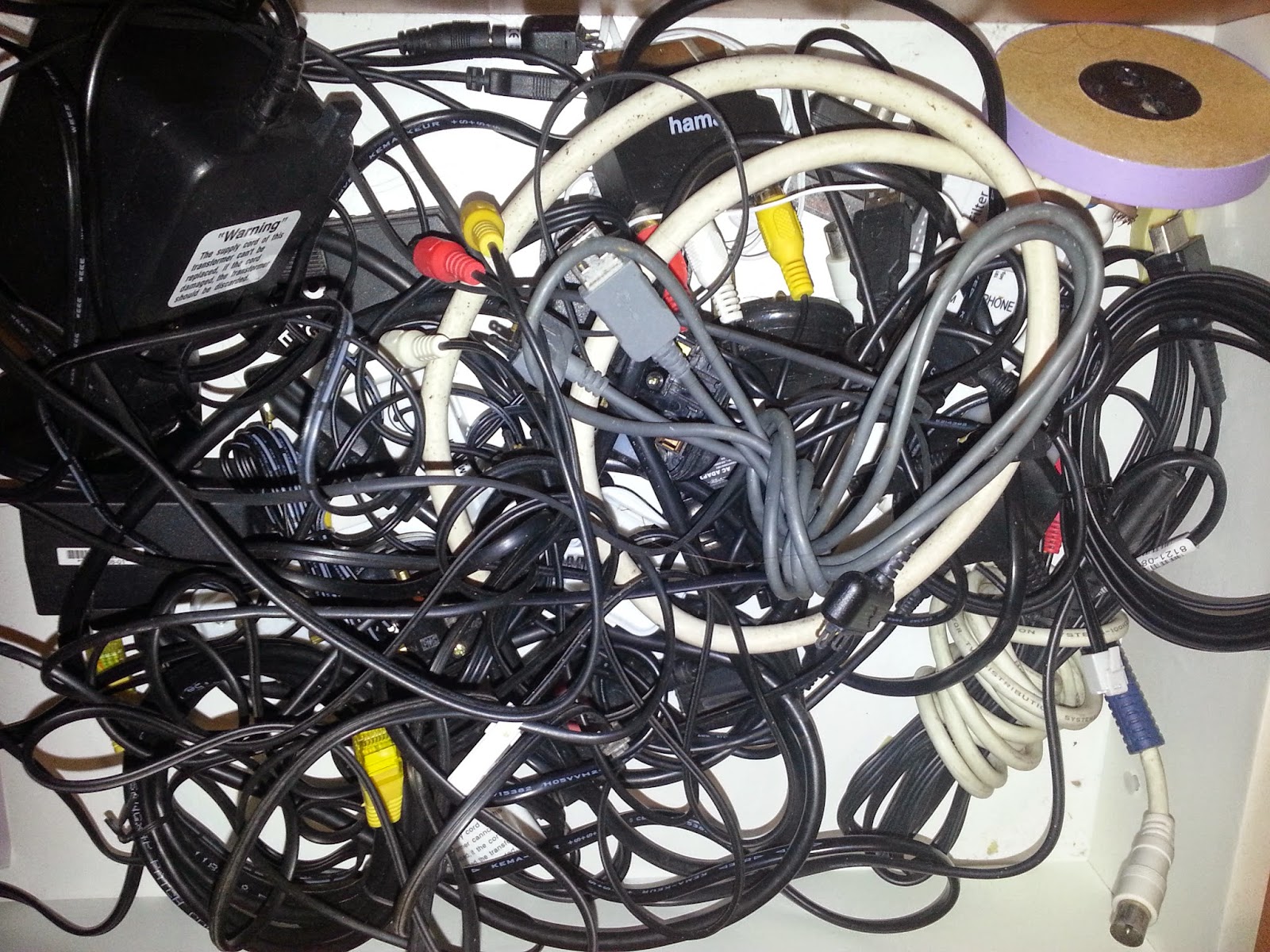 Drawer full of assorted wires. 