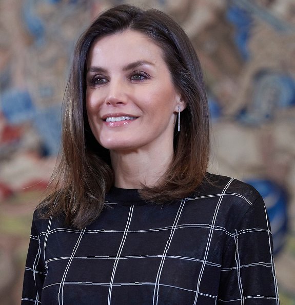 Queen Letizia wore Hugo Boss knitted sweater in tube jacquard. The Queen wore a new sweater by Hugo Boss