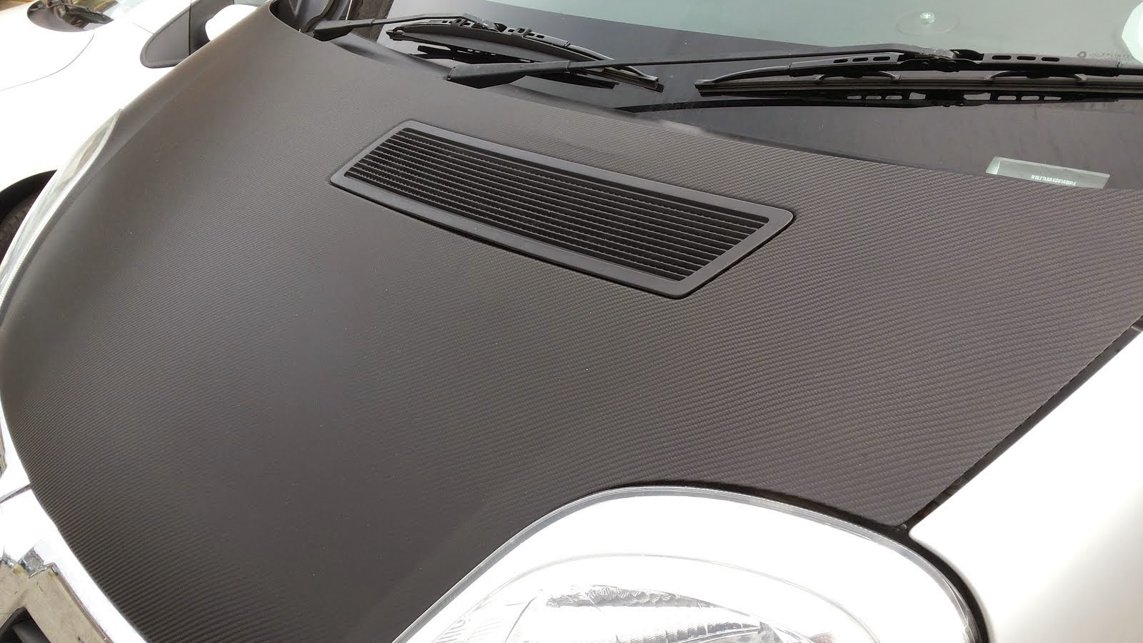 The Green I Signs Blog carbon fiber vinyl wrap on vauxhall