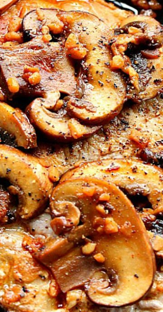 Garlic Butter Mushroom Pork Chops Recipe - Tender and juicy chops seared and simmered in garlicky butter and mushrooms. Quick dinner with a ton of flavor! #garilic #healthyrecipes @HealthyLivingandLifestyle