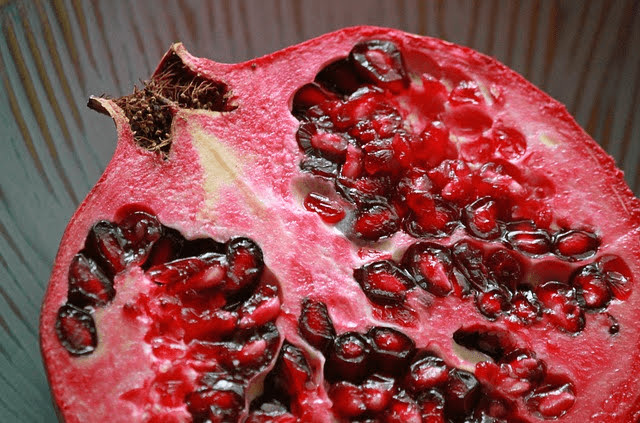 Half cut pomegranate fruit