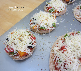 English Muffin Mini Pizza Recipe: Perfect for Parties - www.sweetlittleonesblog.com