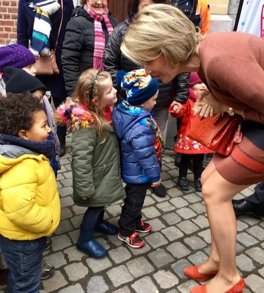 Queen Mathilde wore Natan dress, Natan suede pumps and Valentino python handbag. valentine's day gift