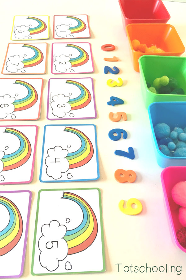 FREE printable Rainbow themed counting cards for toddlers and preschoolers, perfect for a Spring or St. Patrick's Day math activity. Hands-on activity to develop number recognition and one-to-one correspondence.