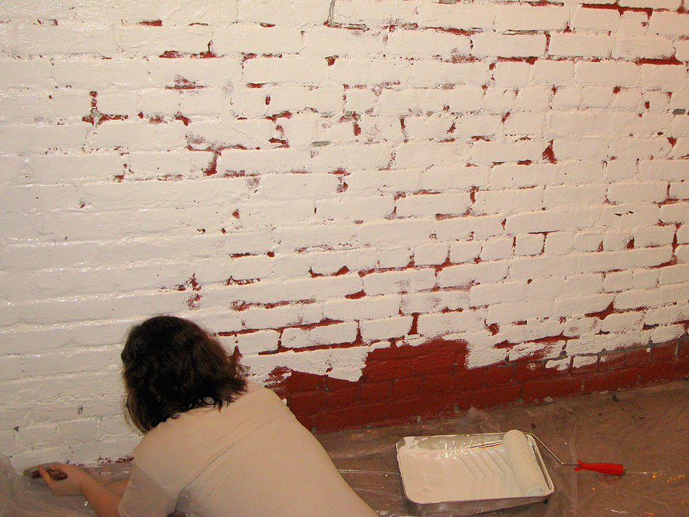 Making Our Brick Basement Apartment a Home Painting the Brick Wall