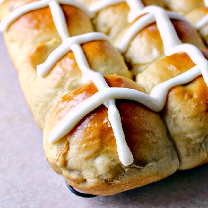 Easy Hot Cross Buns by Renee's Kitchen Adventures on tray with a frosting X
