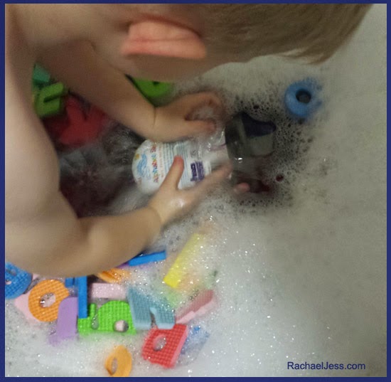Learning through play with H&A foam letters and tub