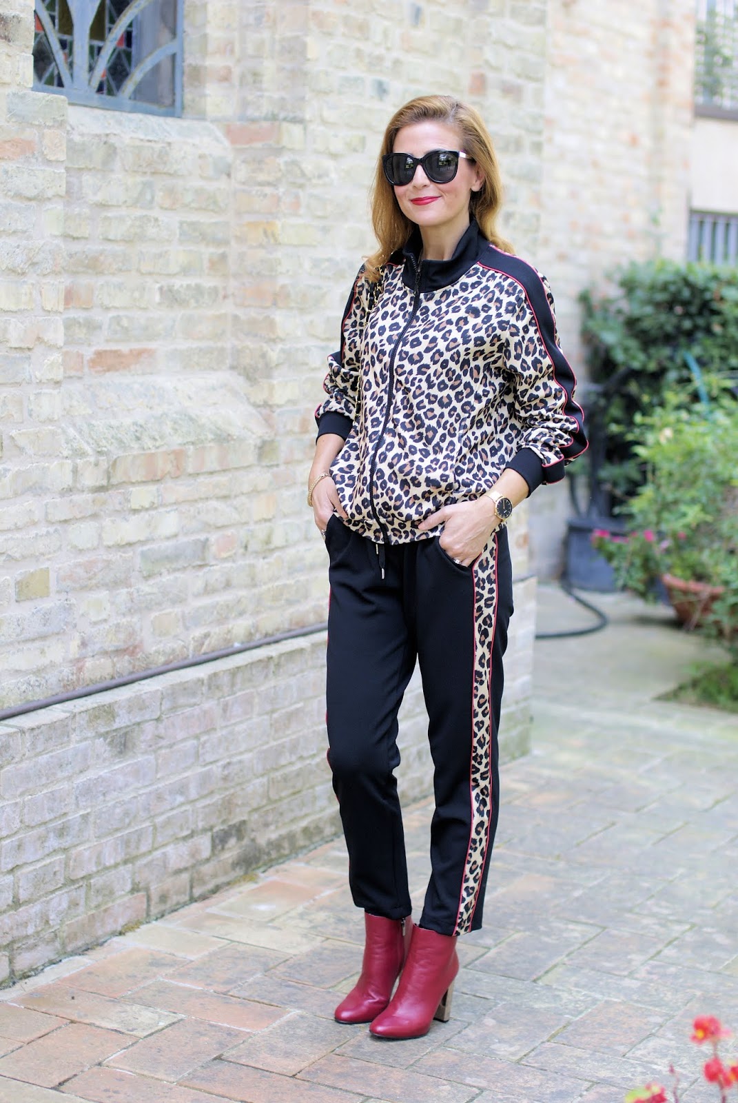 The animal print trend: leopard print tracksuit and Le Silla ankle boots on Fashion and Cookies fashion blog, fashion blogger style